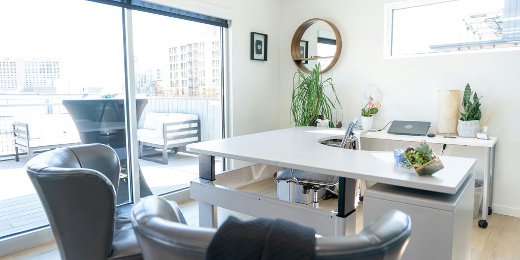 Modern office space with a bright, sunny interior.