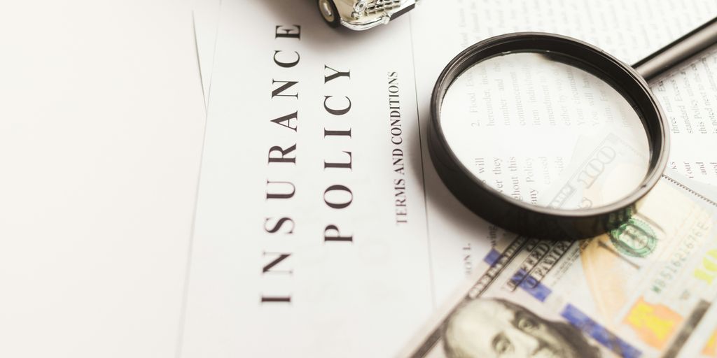 a magnifying glass sitting on top of a piece of paper