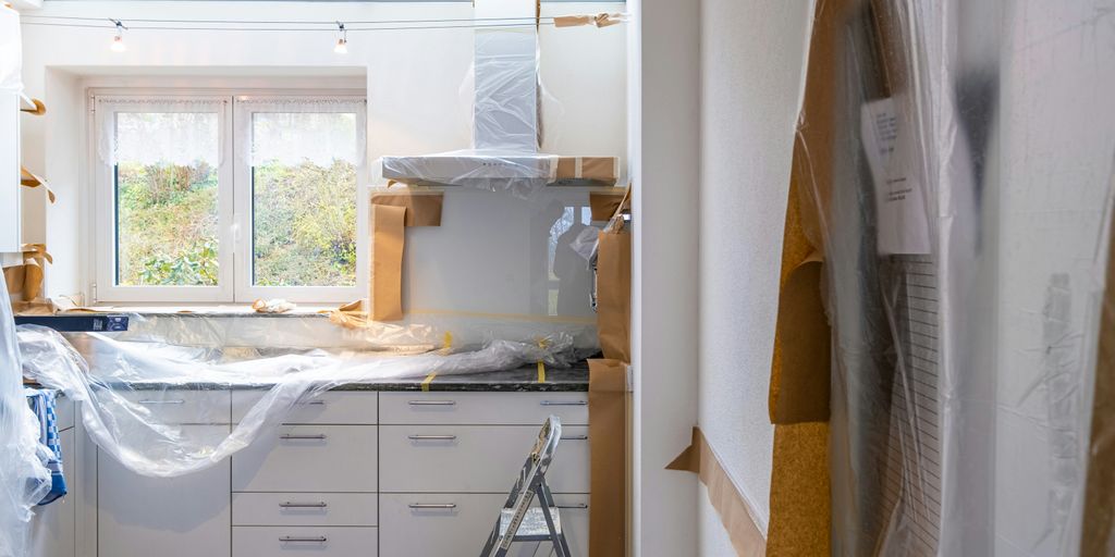 Ultimate Guide to Kitchen Renovations in Mississauga: Trends, Costs & Timeline white wooden cabinet near window