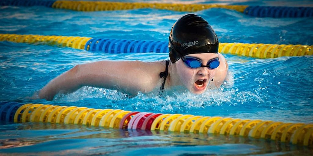 swimmer eating healthy food supplements endurance
