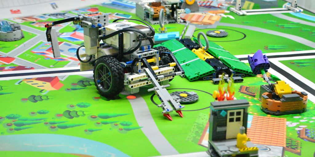 remote control toy car on green car track