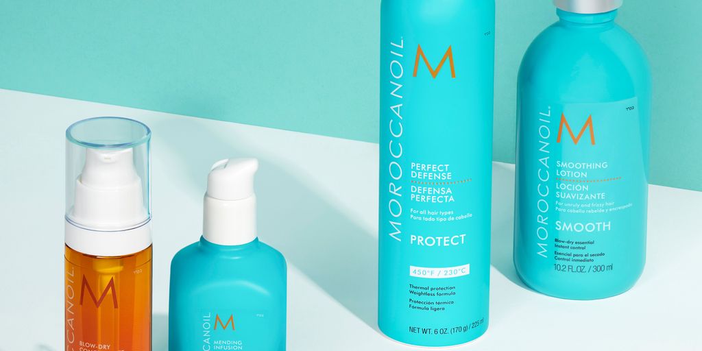 Haircare products display on a teal and white background.