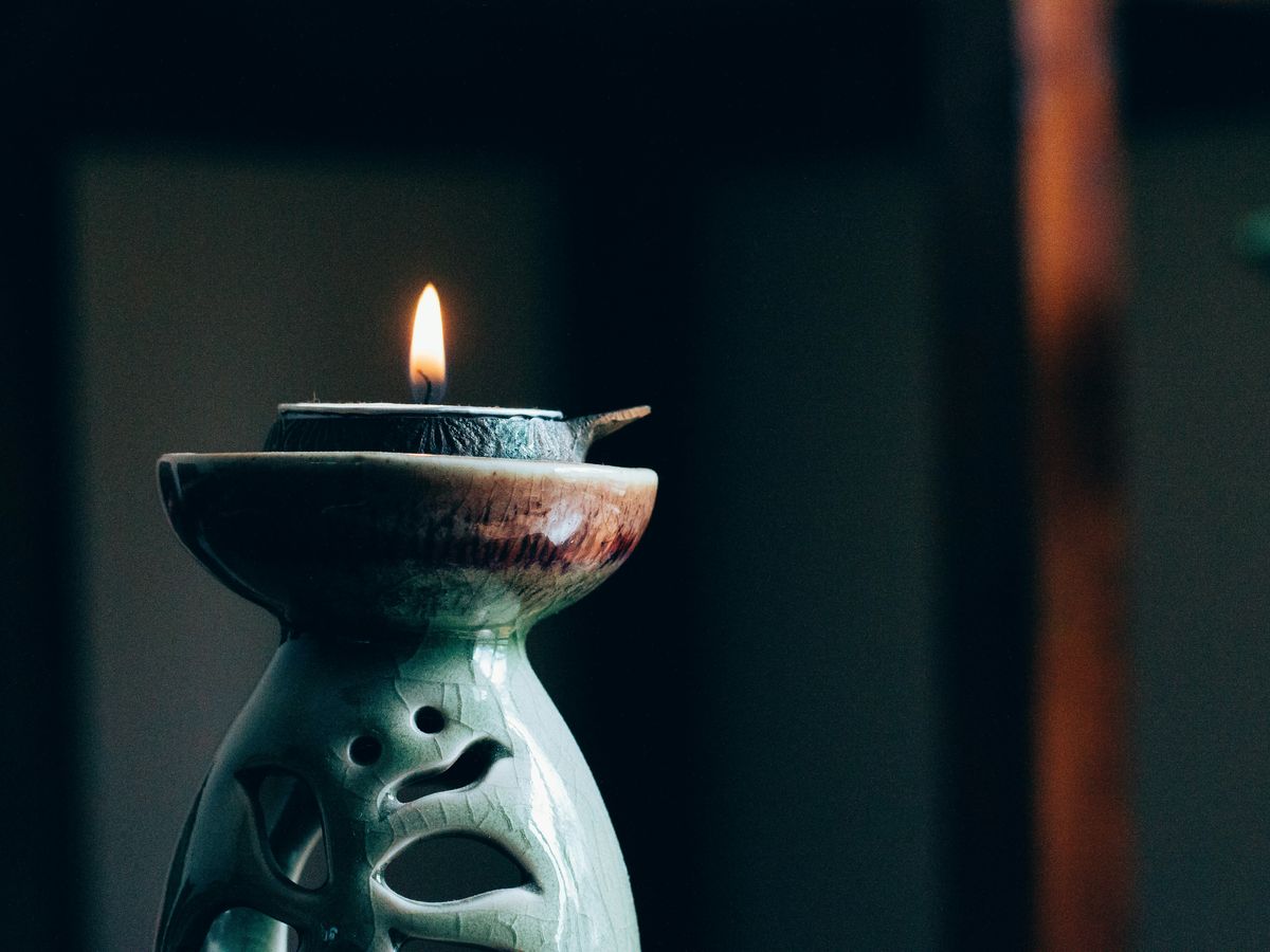 rule of thirds photography of lit candle
