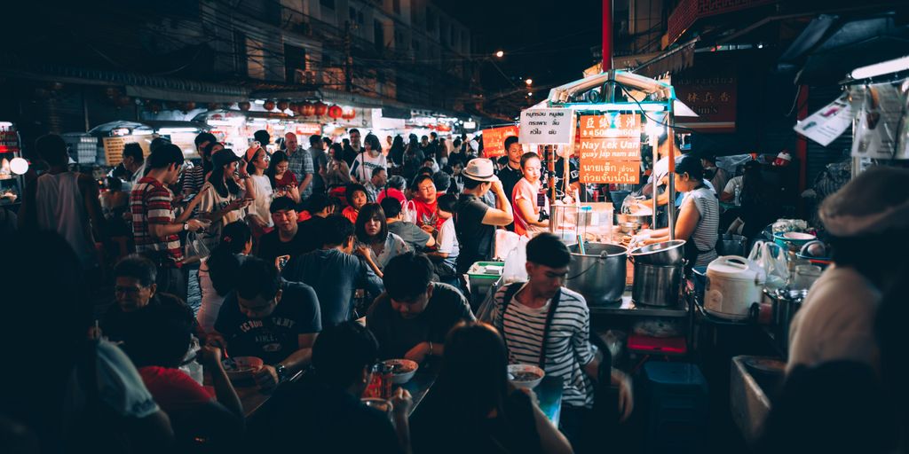 people eating on street