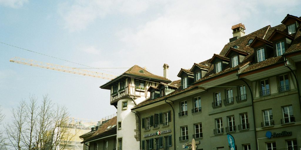 white and brown concrete building during daytime