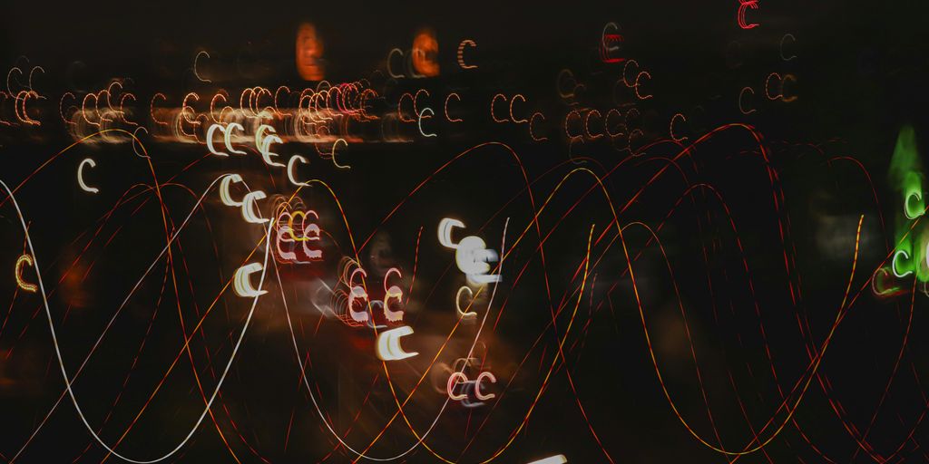 a blurry photo of a city at night