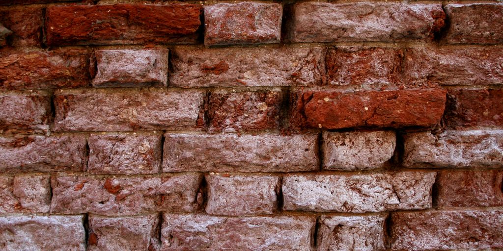 A close up of a brick wall made of bricks