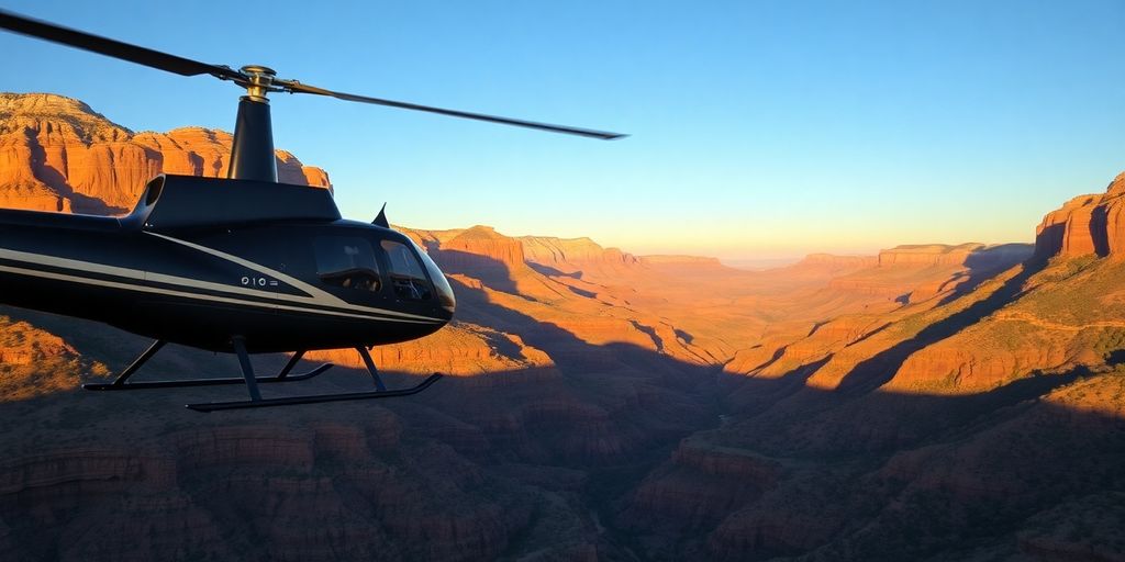 A helicopter flying over the red rock formations of Sedona.