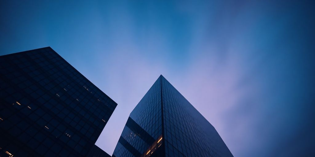 Glistening skyscraper against a twilight sky.