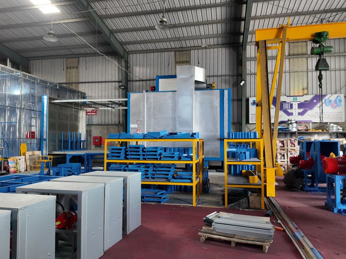 Industrial workspace with machinery, tools, and organized equipment.