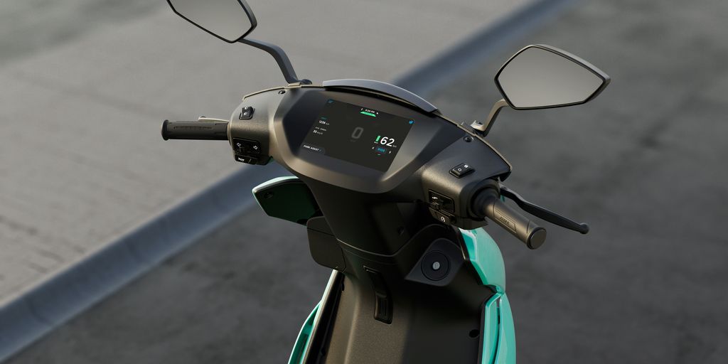 black and green motorcycle with green cover