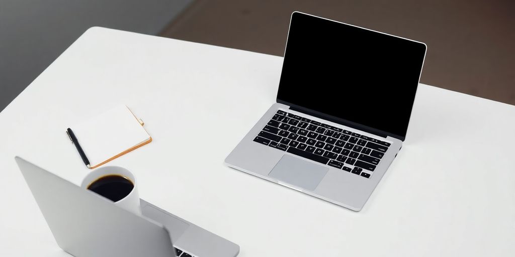 Modern workspace with laptop and coffee, showcasing simplicity.