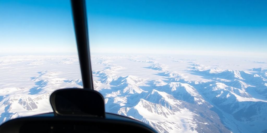 A helicopter flies over a vast, snow-covered Alaskan glacier.