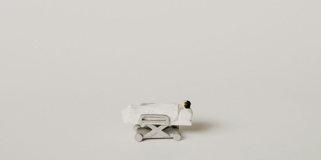 white robot toy on white surface