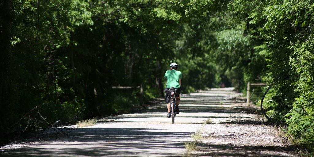 people hiking and biking on greenways in Huntsville