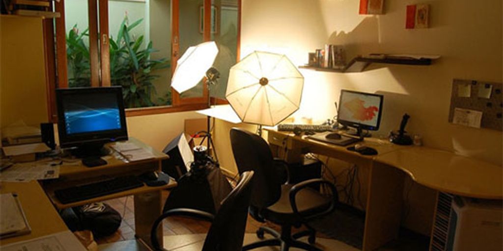 people using graphic design tools in a modern office