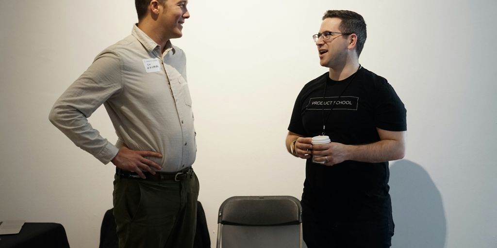 folding chair between two men