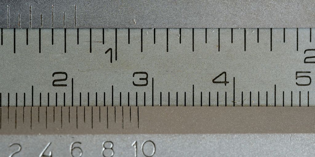 a close up of a measuring tape with numbers on it
