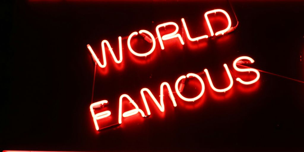 world famous neon light signage