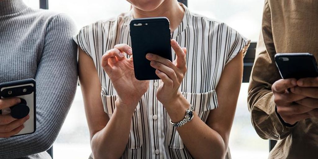 person using smartphone with chat interface, benefits of technology, communication, modern lifestyle