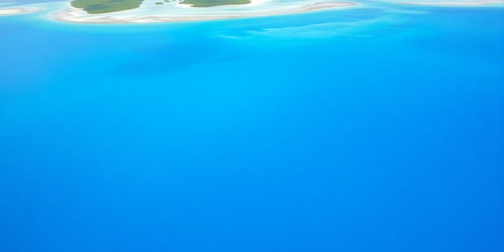 Aerial view of Rangiroa's turquoise lagoon and motus.